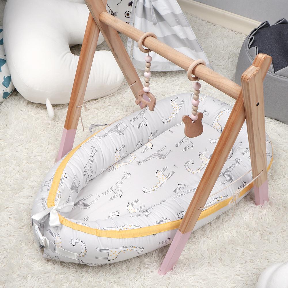 Versatile and Portable Bed Nest Baby Lounger with Adjustable Size Cotton Cover